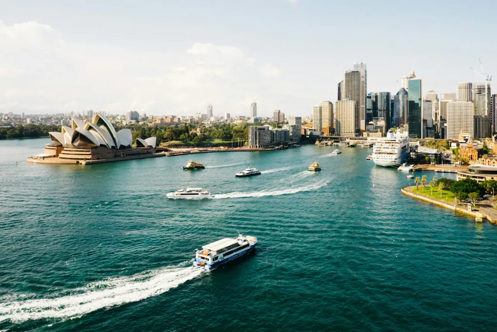 Sydney Opera House and harbor with ferries