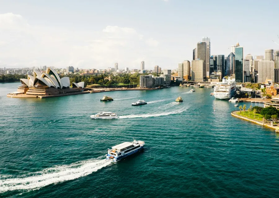 Sydney Opera House and harbor with ferries