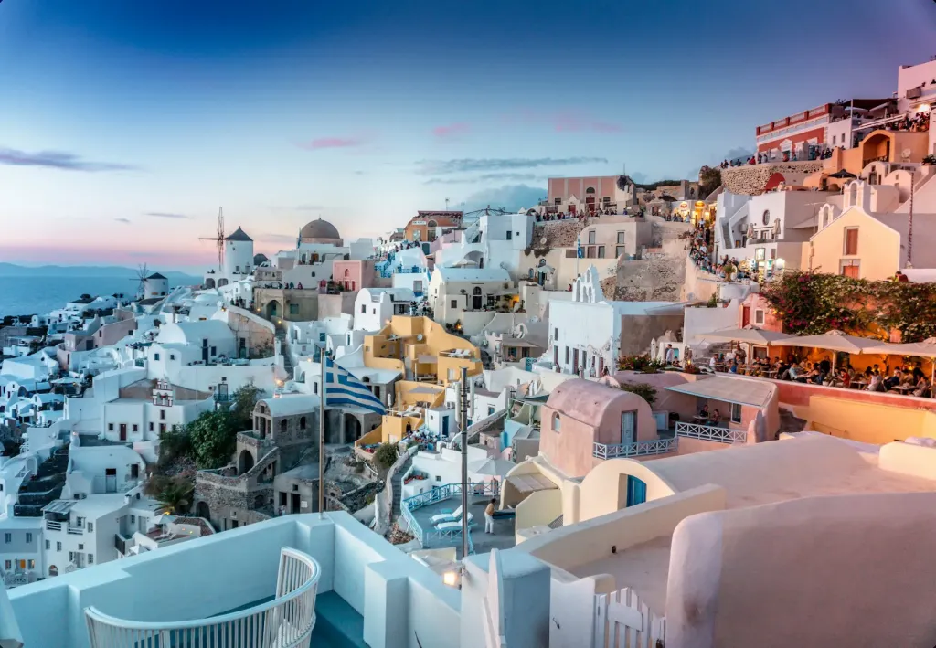 White houses on the Santorini caldera above a blue sea
